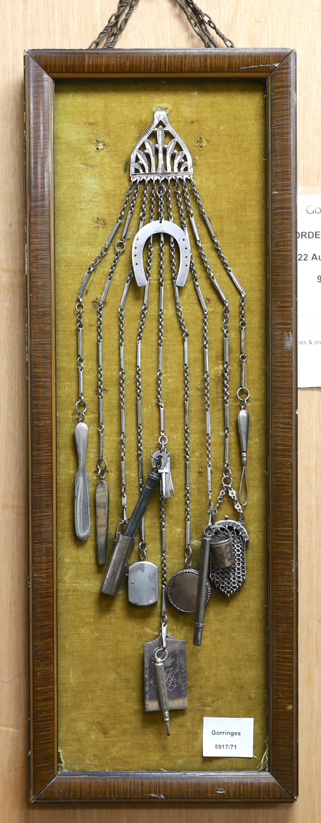 A wall mounted presentation chatelaine